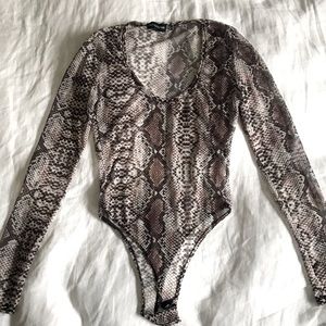 Sheer snakeskin body suit